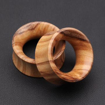 Detail View 1 of A Pair of Olive Wood Organic Double Flared Tunnel Plug-Orange/Brown